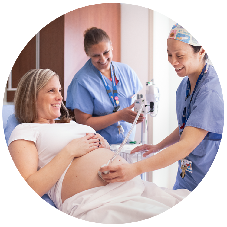 Health-care workers support pregnant patient